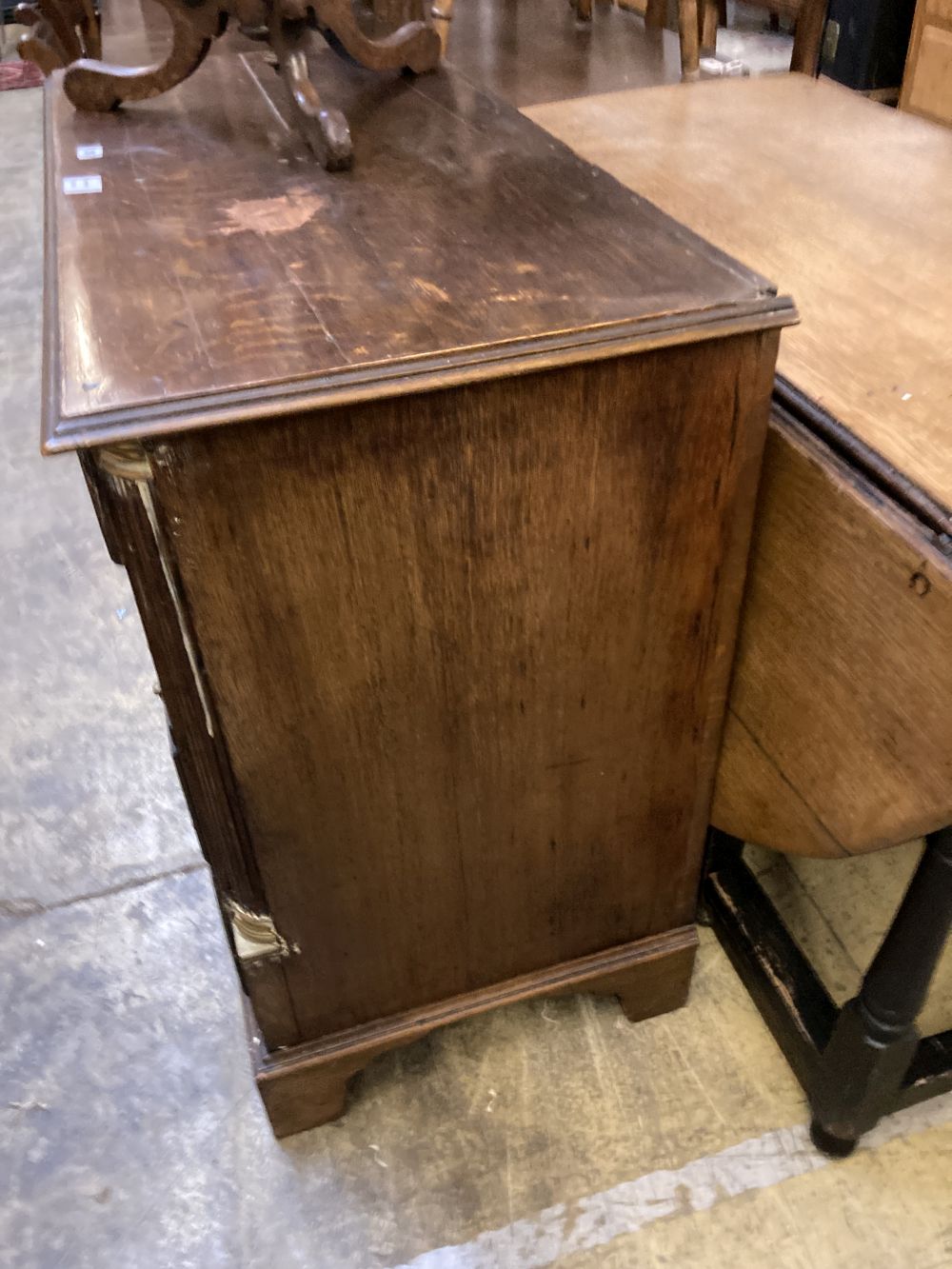 A George III oak chest of drawers, width 100cm depth 48cm height 84cm